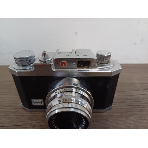 531 - A cased Haking Halina 35X 35mm viewfinder camera fitted with 1:3.5 f=45mm lens