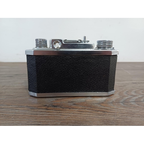 531 - A cased Haking Halina 35X 35mm viewfinder camera fitted with 1:3.5 f=45mm lens