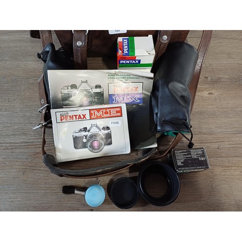 530 - A camera case containing Asahi Pentax ME 35mm SLR camera fitted with Asahi Pentax-M 1:1.7 50mm lens,... 