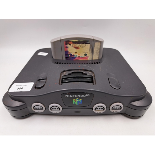 589 - A Nintendo 64 console with Fifa 98 game cartridge