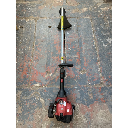 769 - A Champion 25cc petrol strimmer