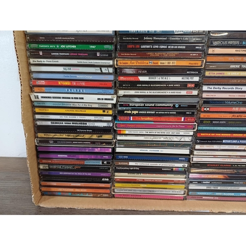 614 - A collection of CDs to include Mr. Scruff, Alabama 3, Ananda Shankar, Richard and Linda Thompson, Ol... 