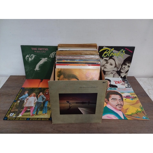 619 - A collection of vinyl records to include Frank Zappa, Uriah Heep, Boz Scaggs, Bad Company, The Who, ... 