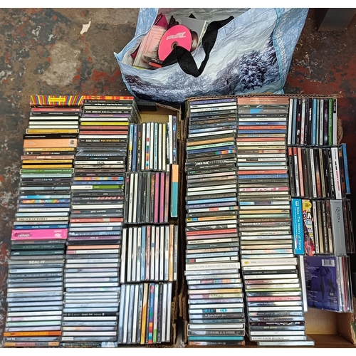 626 - Two boxes and a bag containing a collection of CDs - see images for titles