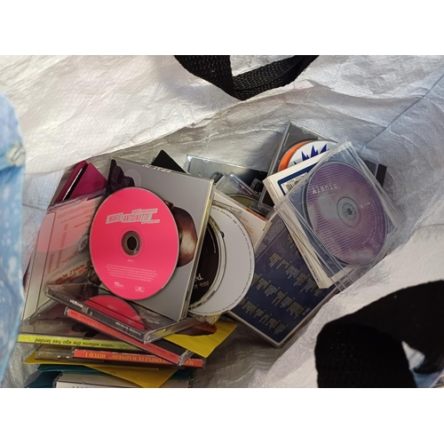 626 - Two boxes and a bag containing a collection of CDs - see images for titles