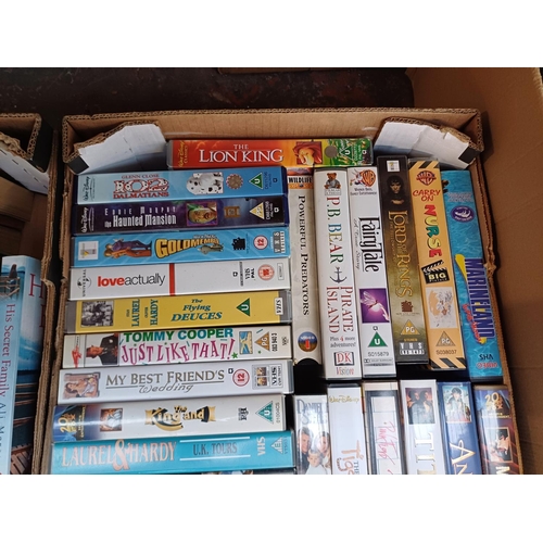 627 - Three boxes containing books, CDs, DVDs, VHS videos, Sony VHS VCR with remote control, Panasonic DVD... 