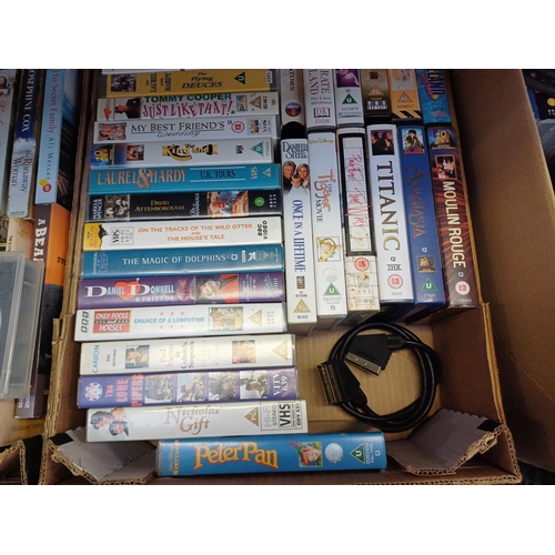 627 - Three boxes containing books, CDs, DVDs, VHS videos, Sony VHS VCR with remote control, Panasonic DVD... 