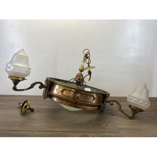 491 - An Arts and Crafts copper and brass three branch ceiling light with etched glass insert and frosted ... 