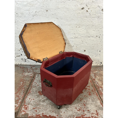 101 - An early/mid 20th century pine storage stool with floral fabric top and vinyl upholstery