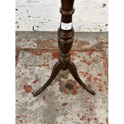 102 - A 19th century style mahogany circular top tripod pedestal jardinière stand - approx. 90cm high x 30... 