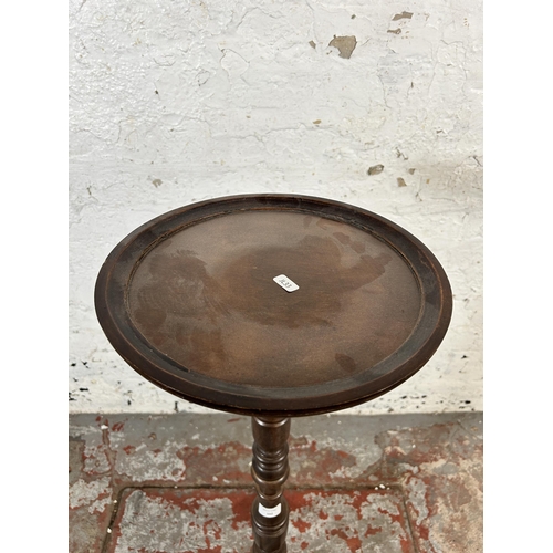 102 - A 19th century style mahogany circular top tripod pedestal jardinière stand - approx. 90cm high x 30... 