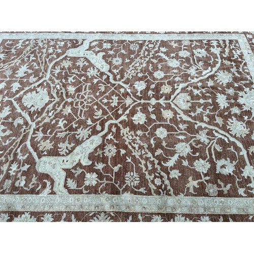 111 - A modern floral pattern rug - approx. 375cm x 273cm