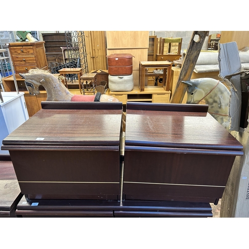 113 - A pair of late 20th century mahogany effect bedside cabinets