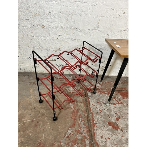 118 - Three pieces of mid 20th century furniture, one red and black wired metal bottle rack, one wired met... 