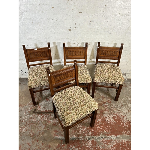 120 - Four carved oak and floral fabric upholstered dining chairs