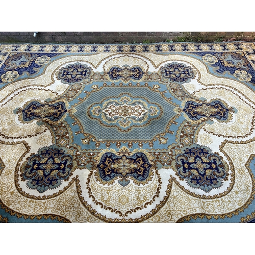 123 - A Carmel Carpets Royal 100% wool rug - approx. 250cm x 350cm