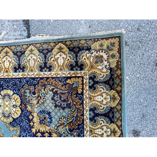 123 - A Carmel Carpets Royal 100% wool rug - approx. 250cm x 350cm