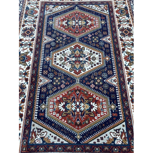 124 - A Firth Carpets Ltd. Emperor rug - approx. 274cm x 183cm