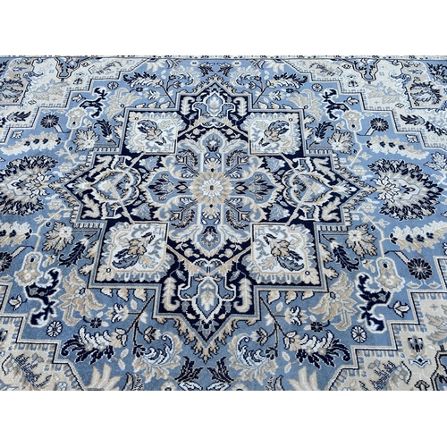 125 - A Royal Tabriz 100% pure wool rug - approx. 340cm x 250cm