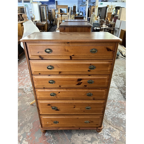 127 - A modern pine chest of drawers - approx. 128cm high x 86cm wide x 41cm deep