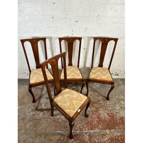 139 - Four Edwardian walnut dining chairs