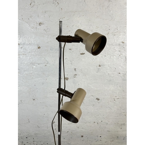 140 - A mid 20th century metal two light standard lamp - approx. 148cm high