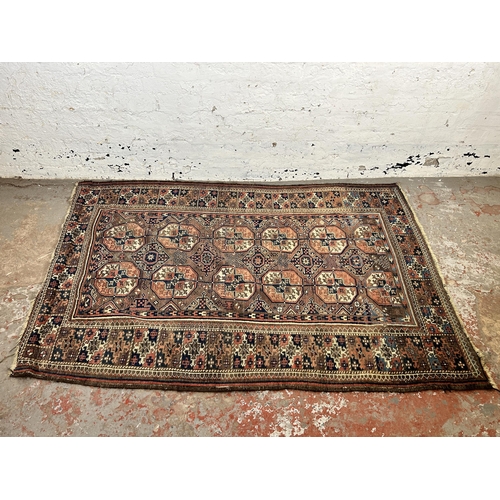 148 - A Persian hand knotted rug - approx. 185cm x 128cm