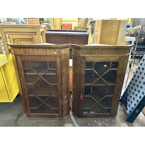 149 - Two Georgian style astral glazed wall mountable corner cabinets, one pine and one oak