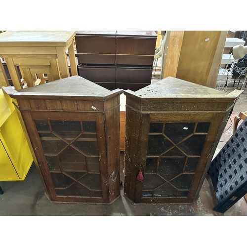 149 - Two Georgian style astral glazed wall mountable corner cabinets, one pine and one oak