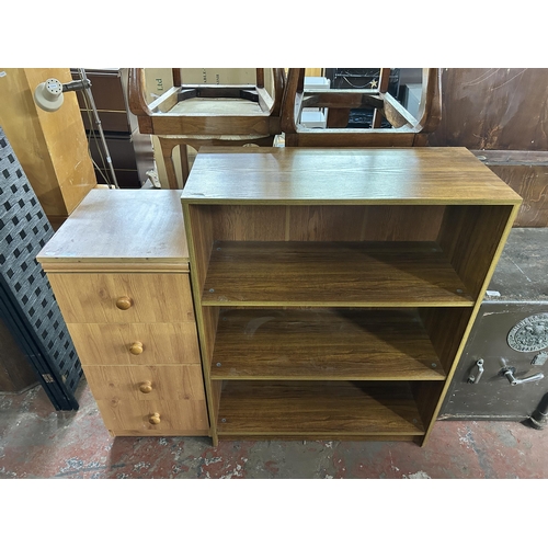 151 - Two pieces of furniture, one pine effect chest of drawers and one teak effect three tier bookcase