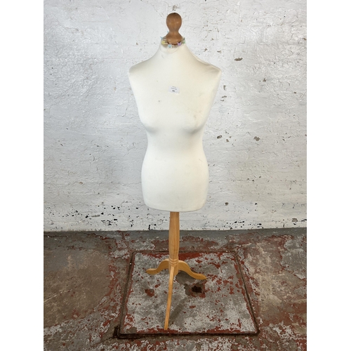 161 - A modern fabric and beech female mannequin torso - approx. 143cm high