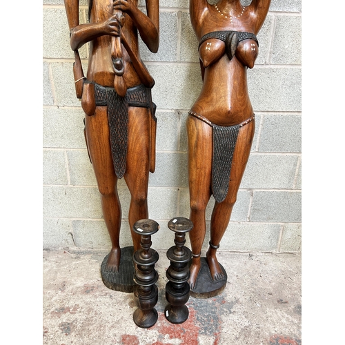 18 - Two Senegalese carved hardwood life sized tribal statues - approx. 192cm high and two carved hardwoo... 