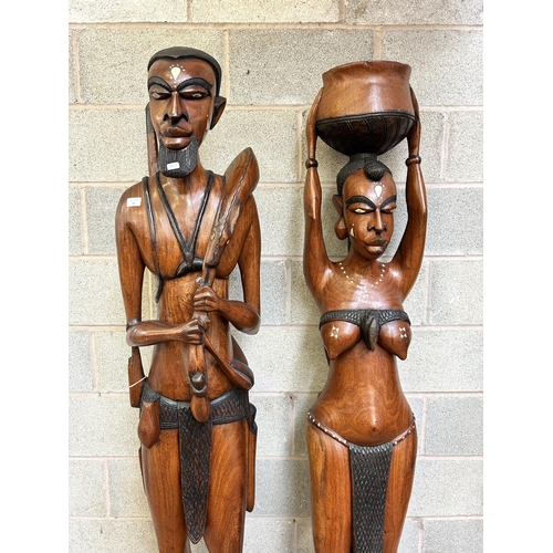 18 - Two Senegalese carved hardwood life sized tribal statues - approx. 192cm high and two carved hardwoo... 