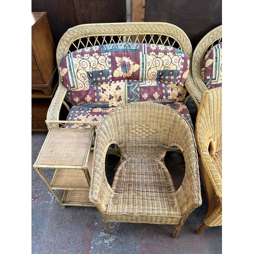 182 - Seven pieces of furniture, wicker and cane three piece conservatory suite, two wicker armchairs, wic... 