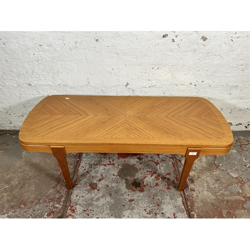 192 - A mid 20th century teak coffee table - approx. 41cm high x 50cm wide x 120cm long