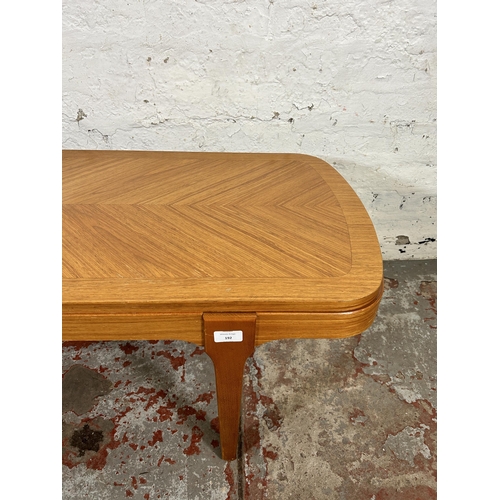 192 - A mid 20th century teak coffee table - approx. 41cm high x 50cm wide x 120cm long