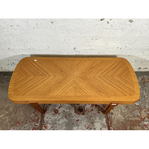 192 - A mid 20th century teak coffee table - approx. 41cm high x 50cm wide x 120cm long