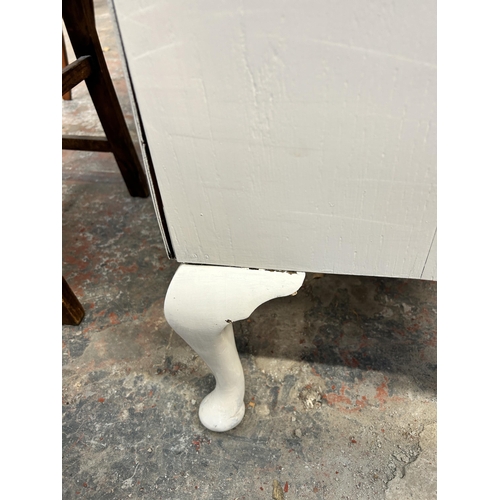 200 - A mid 20th century white painted chest of drawers on cabriole supports - approx. 72cm high x 61cm wi... 