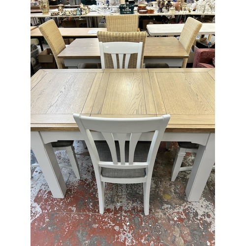 217 - A modern oak and grey painted extending dining table and four chairs - approx. 80cm high x 90cm wide... 