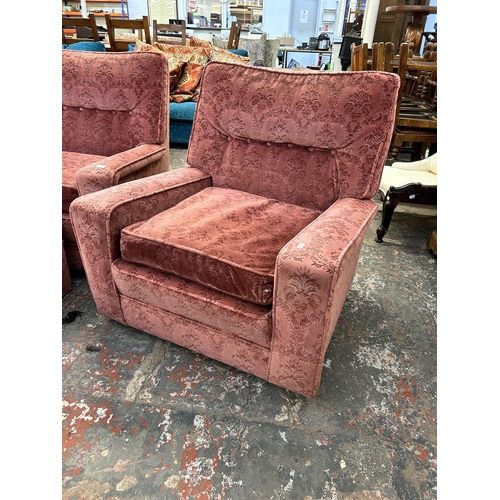 219 - A mid 20th century pink fabric upholstered four piece lounge suite comprising three seater sofa, two... 