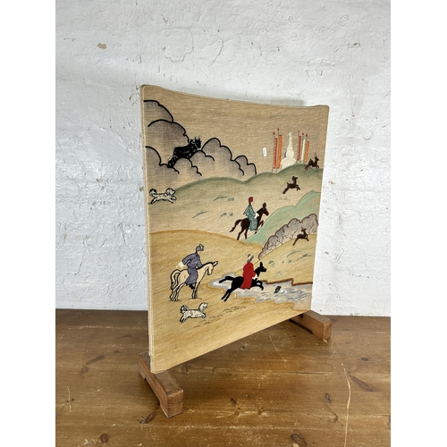 233 - A 20th century embroided fire screen on wooden stand - approx. 83cm high x 67cm wide