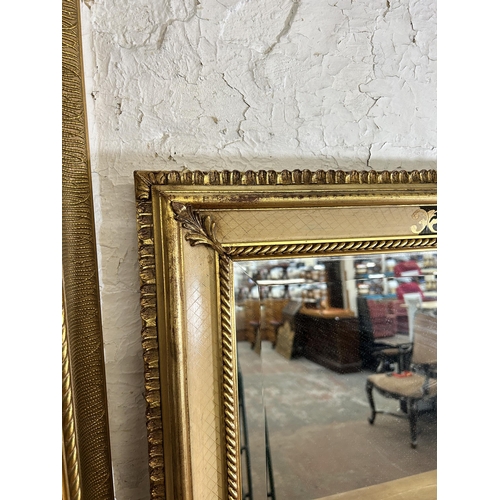 238 - Two gilt framed wall mirrors - largest approx. 88cm high x 66cm wide