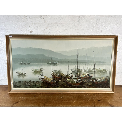 243 - Three framed landscape scene oil paintings - largest approx. 68cm high x 134cm wide