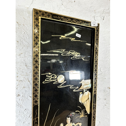 268 - A Chinese black lacquered and mother of pearl decorated wall plaque - approx. 91cm high x 30cm wide