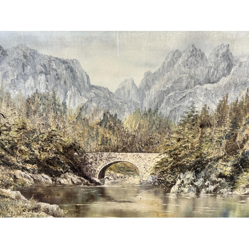 270 - A gilt framed oil on board of a bridge and mountain scene, signed Geraldine and dated 1982 - approx.... 