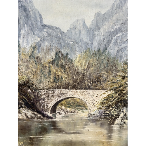 270 - A gilt framed oil on board of a bridge and mountain scene, signed Geraldine and dated 1982 - approx.... 