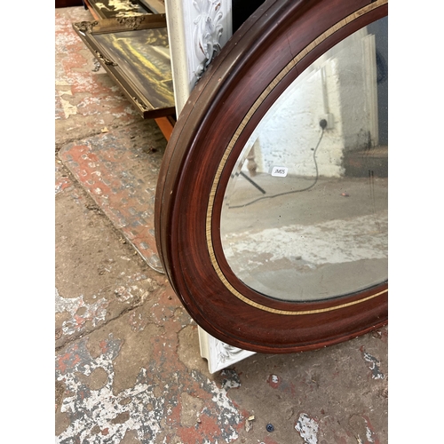 273 - Two wall mirrors, one French style white painted and one Edwardian oval bevelled edge