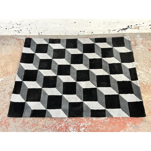 34 - A Plantation Rug Geometric black and grey 100% rug - approx. 170cm x 120cm