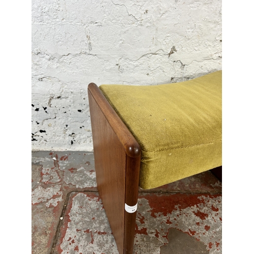 42 - A mid 20th century teak and green fabric upholstered dressing table stool