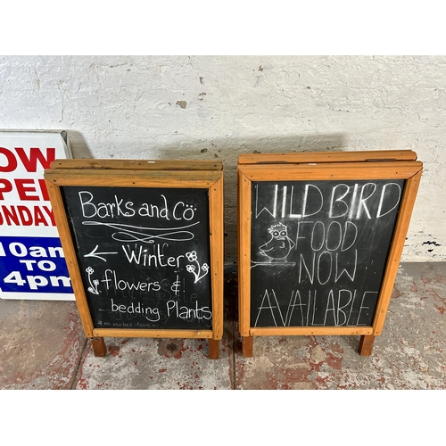 44 - Three advertising A boards, two wooden framed - approx. 95cm high x 63cm wide and one metal - approx... 